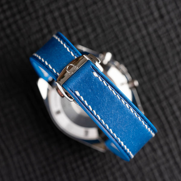 Turquoise Maya Omega-Style Deployant leather strap with white hand-stitching